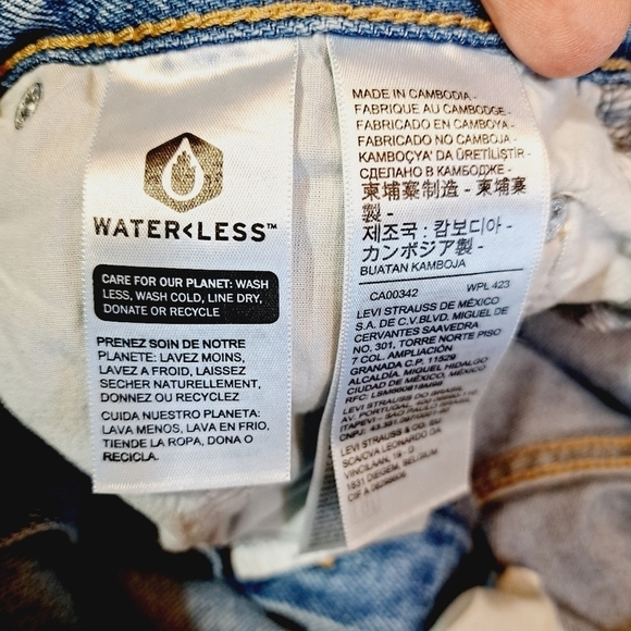 Levi's Premium Light Wash High Loose Taper Distressed Size 28 - Picture 9 of 12